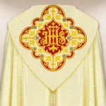 Ecru embroidered liturgical cape with the IHS symbol