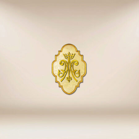 Embroidered "M" appliqué