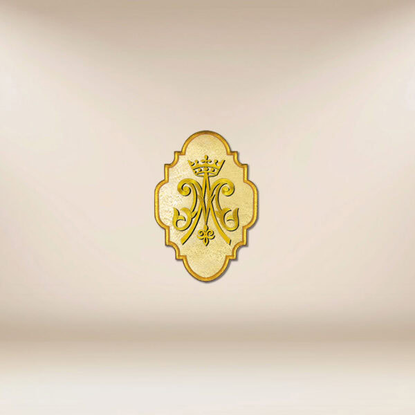 Embroidered "M" appliqué