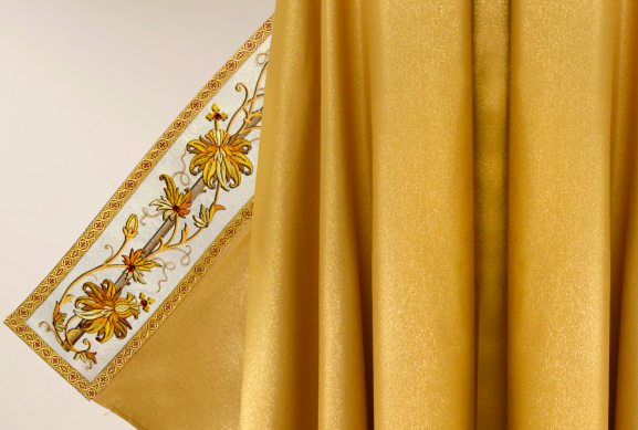 Close up of sleeve embroidery on Classico Gold liturgical vestment with floral ornament