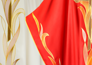 the delicate lines of the ornament on the liturgical chasuble; an embroidery detail