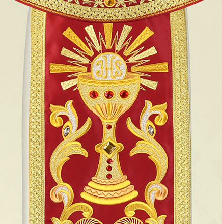 the chalice symbol in the embroidered decoration of a liturgical vestment