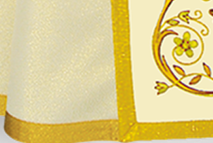 Detailed gold embroidery inspired by Eucharistic symbolism